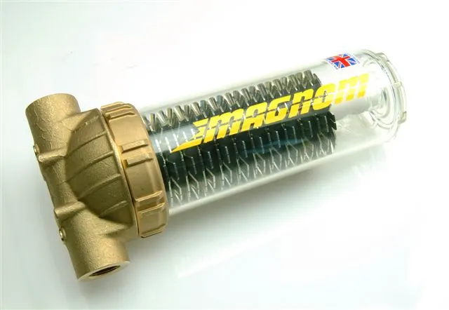 A Magnom Clear 10 with a brass head and a clear bowl showing the core inside