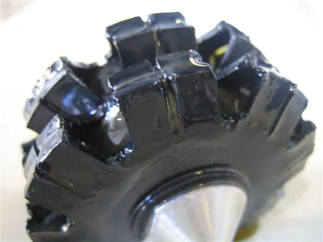 A Magnom core coated in oil and ferrous debris